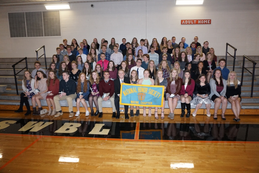 photo of many people in bleacher seating